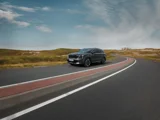 Kia Sorento 2025 PHEV donkergrijs rijdend op weg